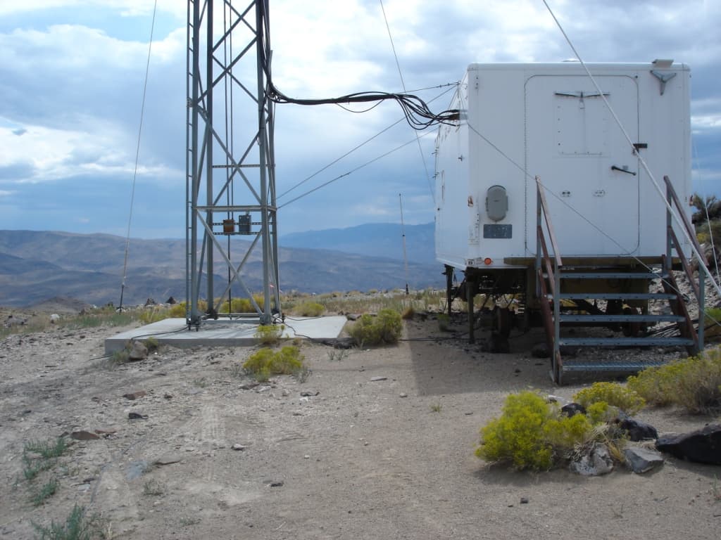Communications tower field site representative of infrastructure project experience
